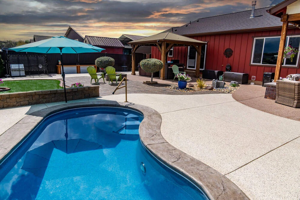 Decorative pool deck coating with anti-slip texture on Maui