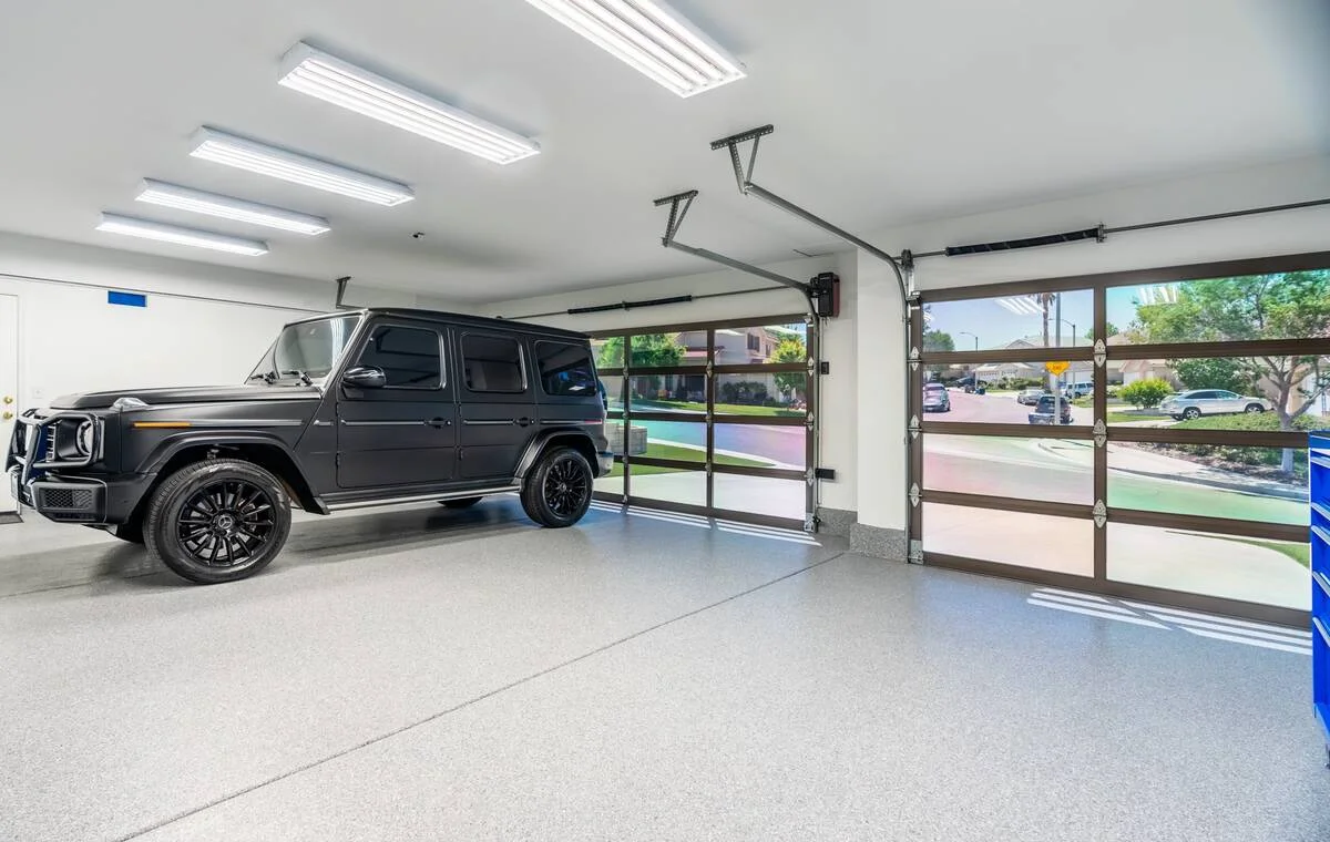 Polyaspartic floor coating with decorative flake finish installed on a Maui property