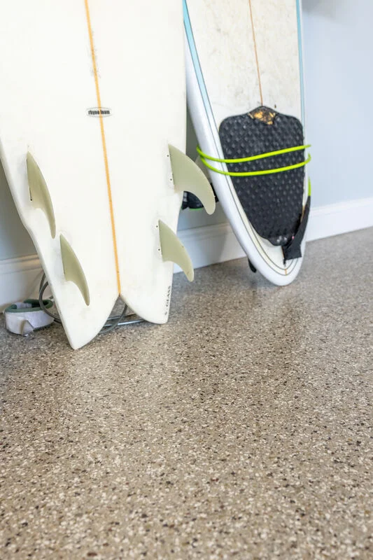 Glossy polyaspartic coating with flake finish installed by Innovative Coatings on Maui