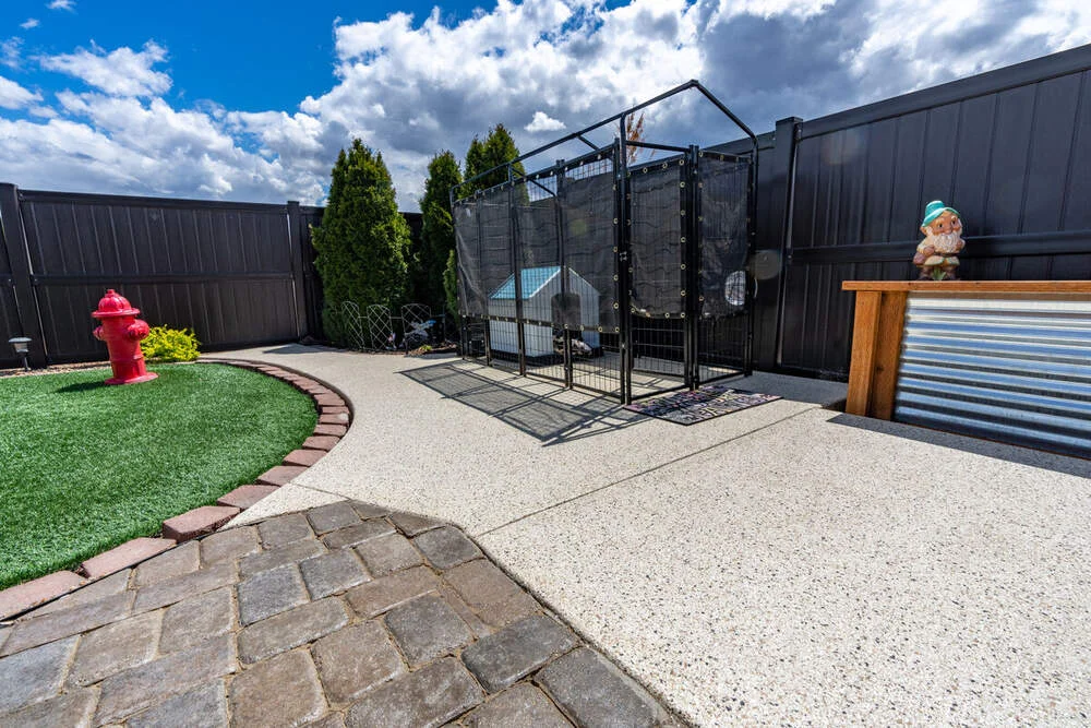 Slip-resistant flake coating on an exterior concrete surface in Maui